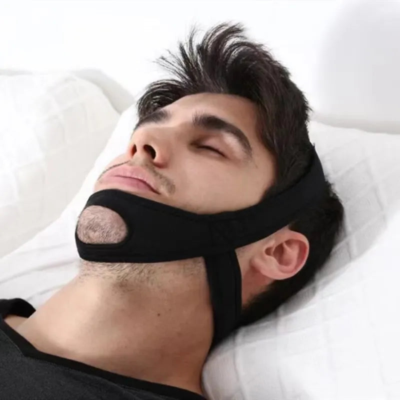 Anti-snoring chin strap worn during sleep
